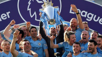 Man City completes treble